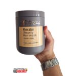 ماسک مو تاپ کندی بیوتی در دست